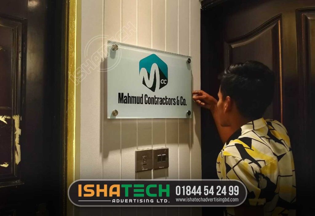 Names are required to identify individuals. Office Door Name Plate Price in Bangladesh. Similarly, the need for a name plate is very important for the identity of your company or home. A person is like a stranger without a name. Likewise, your company or your home is unknown without a nameplate. So bring the identity of your organization or home to everyone. You have Nameplate Design BD on your side. Our service product; Customizable Wooden Door Name Plate, Name plate in Bangla , 37 Name Plate in BD ideas, Digital Sign-Wooden Name Plate, name plate price in Bangladesh, modern house name plate design door name plate design online, Name Plates Stainless Steel Makers Price in Dhaka, name plate designs images, barer name plate design, door name plate design, name plate design for office, name plate design online free, Office Name Plate, wood board etc.